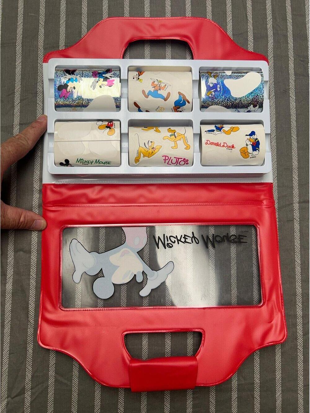 Disney Mickey Mouse sticker set housed in a red carrying case. Some stickers